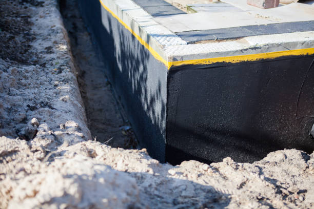 Professional Waterproofing technician working in Phoenix, IL
